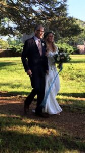 Steve Szkotak walks his daughter Molly down the aisle at her wedding in May 2016.