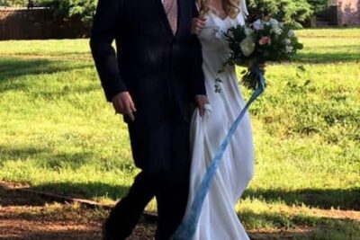 Steve Szkotak walks his daughter Molly down the aisle at her wedding in May 2016.