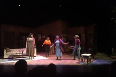 Shannon Lamb, Maggie Miller, Johnnie Mae, Brianna Sloane and Toni Ann DeNoble at the end of Jar the Door at New Century Theatre. 