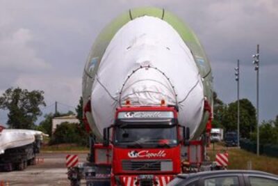 Along a specially made paved siding, this Airbus A380 is ready to be put together as it is transported from the UK to Toulouse, France.