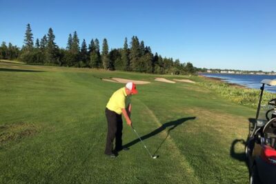 Jason Porter pretends to tee off at the Algonquin Hotel