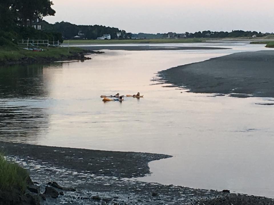 Floating down the Ogunquit river to the ocean at Ogunquit Beach, Maine.