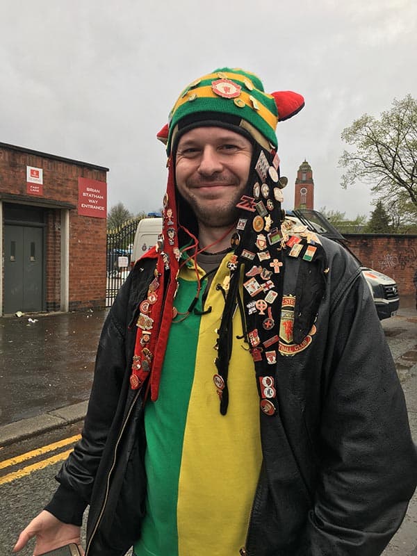 A Manchester United fan outside of Old Trafford stadium.