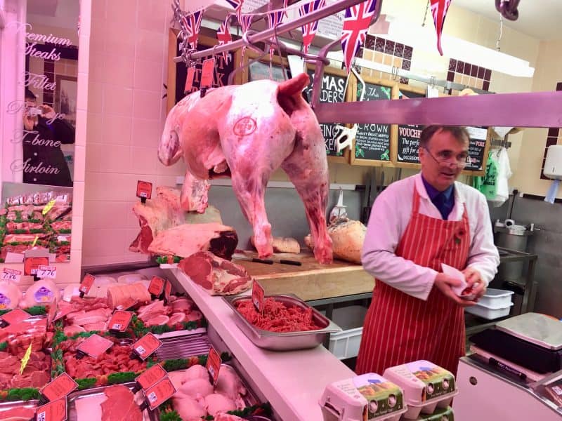 R. Norman, local butcher in Seaton. 