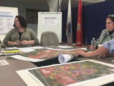 Jessica Atwood, center, of FRCOG discusses how to make South Deerfield a better place for businesses at a recent meeting at Town Hall.