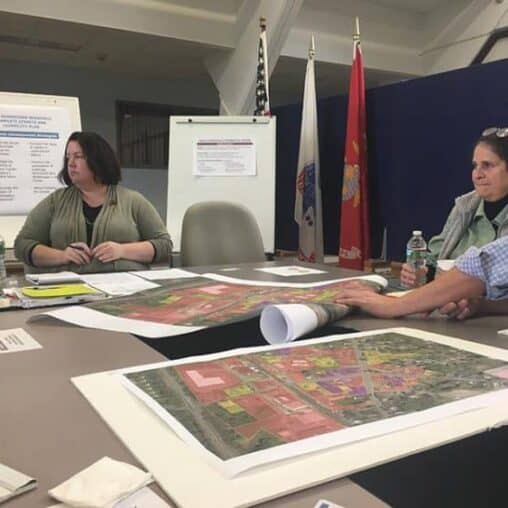 Jessica Atwood, center, of FRCOG discusses how to make South Deerfield a better place for businesses at a recent meeting at Town Hall.