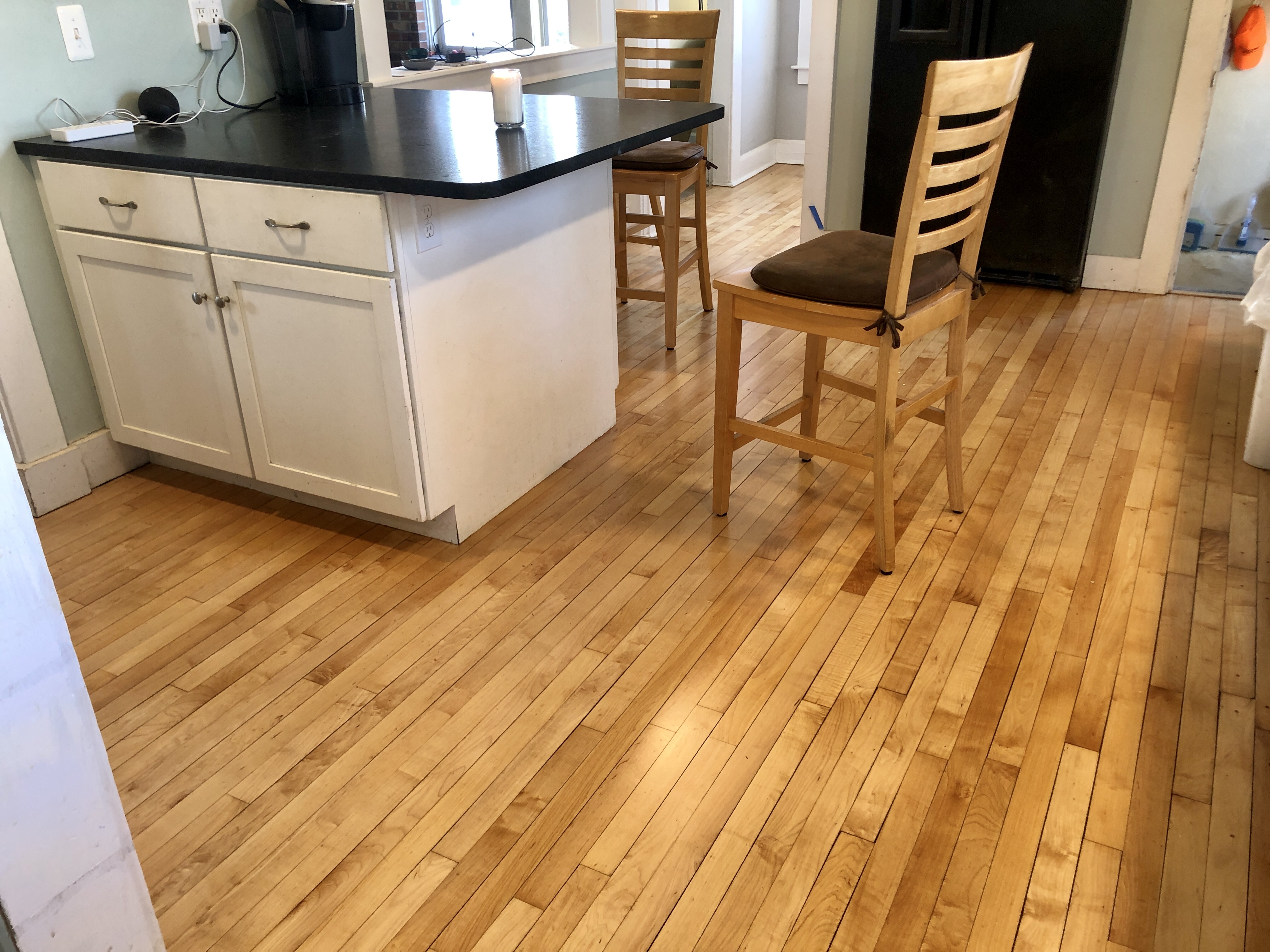 My newly refinished kitchen floor, part of my renovation of 2021.