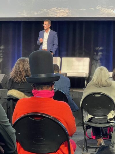 Doug Lansky keynoting at IMM.