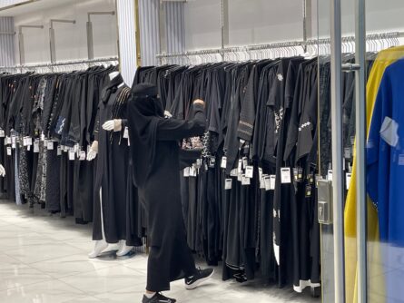 Abaya shopping, they come in many colors but most wear black.