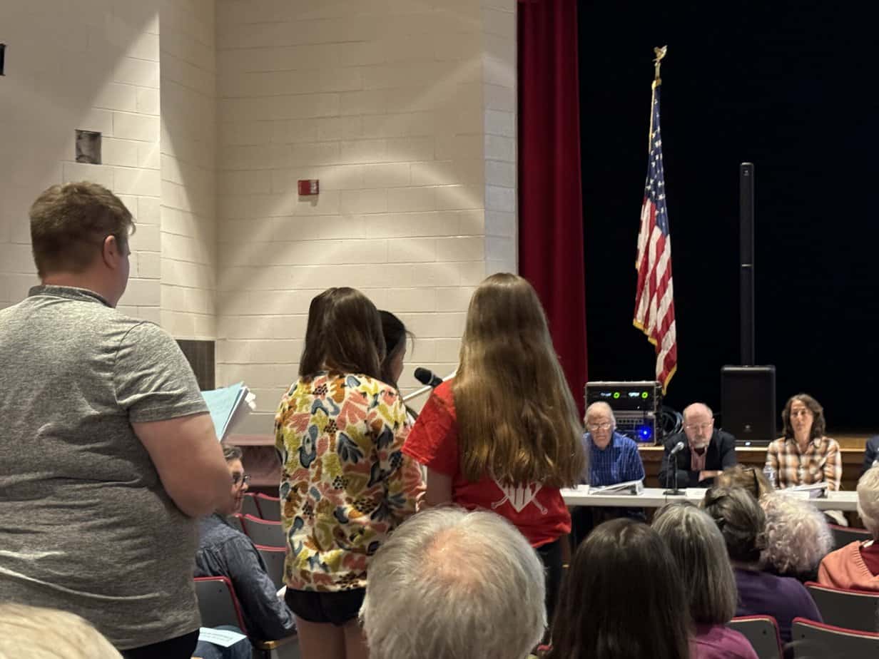 Frontier students and a parent speak in favor of a motion to let 16 and 17-year-olds vote in town elections. It failed by 3 votes.